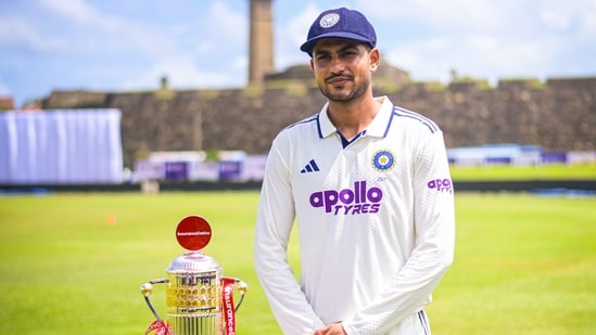 Shubman Gill poses with the trophy during a photoshoot ahead of the first Test.