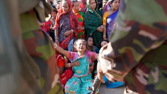 Relatives mourn after a toxic gas leak killed people at Ferdous Steel Shipbreaking Yard and Recycling Factory in Bangladesh's Chittagong on August 14, 2026. (AFP)