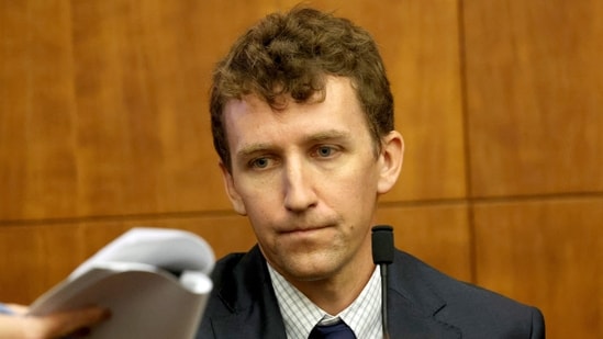 Patrick Clancy, the father of Cora, Dawson and Callan Clancy, looks on from the stand during Lindsay Clancy's murder trial at Plymouth Superior Court, in Plymouth, Massachusetts.