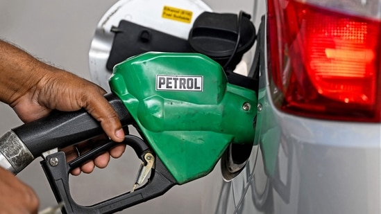 File: A petrol pump attendant refuels a vehicle at a Bharat Petroleum (BP) gas station in Delhi