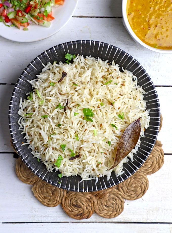 Sanjeev Kapoor’s jeera rice recipe features sautéed basmati rice cooked with aromatic whole spices in ghee. (Pinterest) Sanjeev Kapoor’s jeera rice recipe features sautéed basmati rice cooked with aromatic whole spices in ghee. (Pinterest)