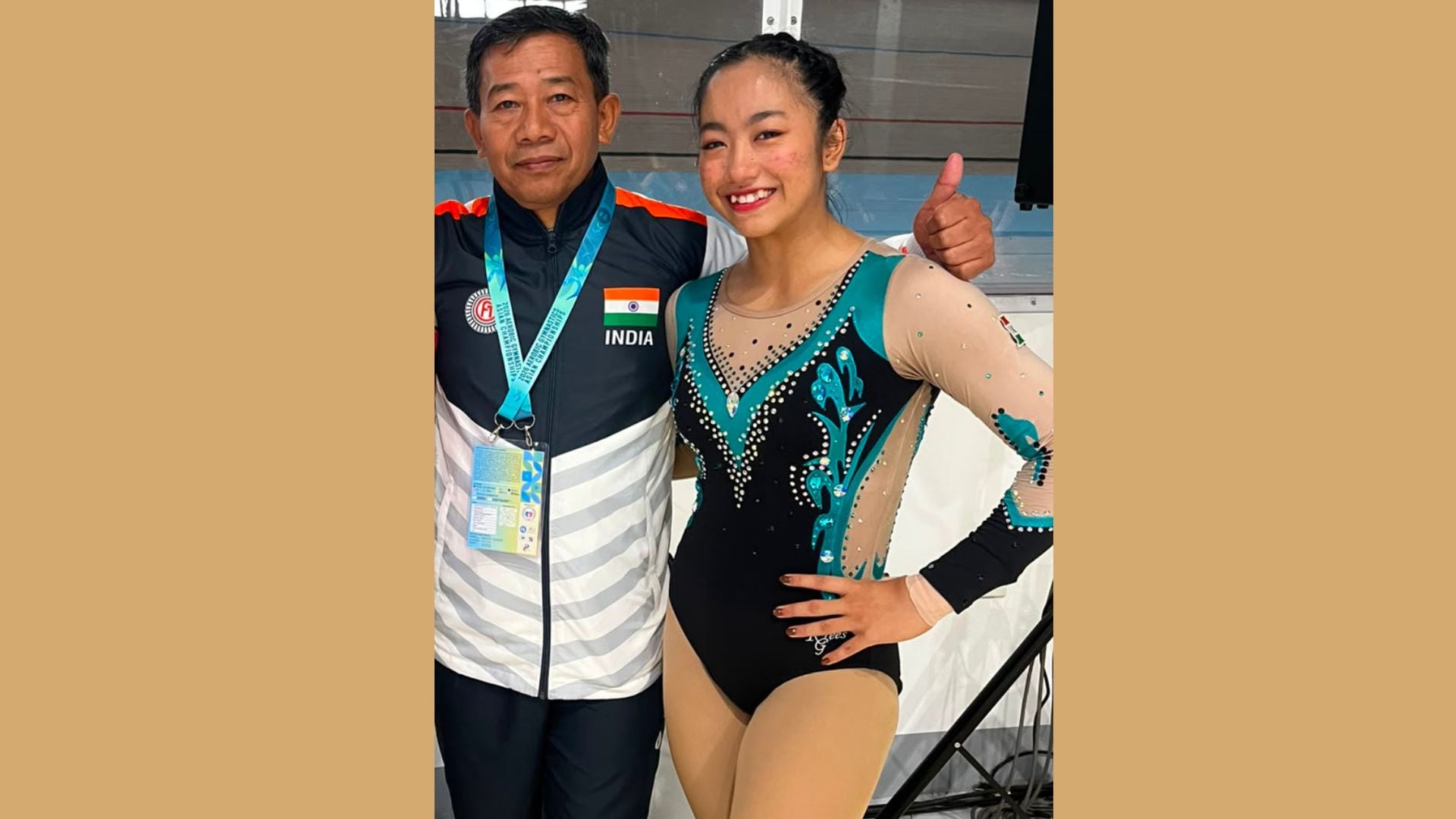 Ariha with coach Yumnam Ranjan Singh. Ariha with coach Yumnam Ranjan Singh.