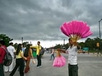 Gram it: With an overcast sky in the background, this cotton candy seller looks spectacular with his stock of sale that he sells at Kartavya Path where visitors gathered in huge numbers during the Independence Day weekend. The weather department has issued a forecast of generally cloudy sky for today, with light spells of rain.(Photo: Amit/ANI)