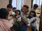 Jharkhand student leader Devendra Nath Mahto scuffles with police as he tries to leave the Sadar hospital in Ranchi on Independence Day.
