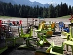 Chairs and tables scattered at the site of the terrorist attack on tourists in Baisaran near Pahalgam in south Kashmir's Anantnag district, last year. 