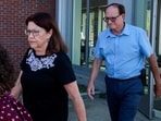 Michael and Paula Musgrove, the parents of Lindsay Clancy, who is accused of killing her children, leave the Plymouth Superior courthouse in Plymouth, Massachusetts, U.S., July 27, 2026.  REUTERS/Brian Snyder