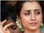 At the Independence Day ceremony in Chennai, Trisha wowed in a luxurious golden saree paired with a textured lime-green blouse. (Instagram/ cs_review)