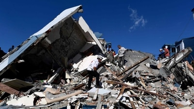 Colombia Earthquake: Rescuers look for survivors amid the rubble of a collapsed building after an earthquake in Pereira, (AFP) Colombia Earthquake: Rescuers look for survivors amid the rubble of a collapsed building after an earthquake in Pereira, (AFP)