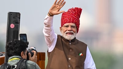 Narendra Modi, India's prime minister, waves to the crowds during the nation's Independence Day ceremony at the Red Fort in New Delhi, (Bloomberg) Narendra Modi, India's prime minister, waves to the crowds during the nation's Independence Day ceremony at the Red Fort in New Delhi, (Bloomberg)