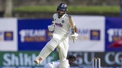 India's Devdutt Padikkal celebrates his century on day one of the first test cricket match between India and Sri Lanka, in Galle. (PTI) India's Devdutt Padikkal celebrates his century on day one of the first test cricket match between India and Sri Lanka, in Galle. (PTI)