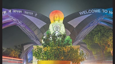 The Noida Gate illuminated with the colours of the national flag in celebration of the 80th Independence Day. (Sunil Ghosh/HT) The Noida Gate illuminated with the colours of the national flag in celebration of the 80th Independence Day. (Sunil Ghosh/HT)