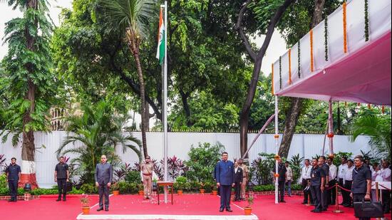 Mumbai, Aug 15 (ANI): Bombay High Court Acting Chief Justice Ravindra V. Ghuge and Maharashtra Chief Minister Devendra Fadnavis after hoisting the National Flag at the Bombay High Court on the occasion of the 80th Independence Day, in Mumbai on Saturday. (@CMOMaharashtra X/ANI Photo) (@CMOMaharashtra X)