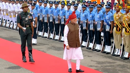 Prime Minister Narendra Modi inspects a Guard of Honour during the 80th Independence Day celebrations, at Red Fort in New Delhi.