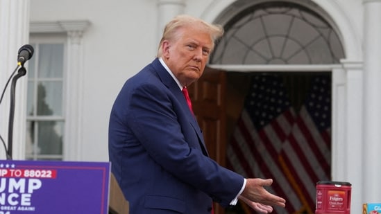 Republican presidential nominee and former US President Donald Trump gestures as he attends a press conference at Trump National Golf Club, in Bedminster, August 15.