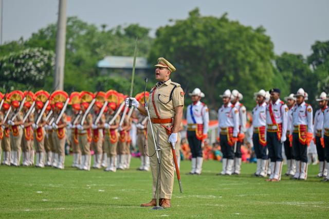 ACP Abhilaksh Joshi commanded the parade during the 80th Independence Day celebration in Tau Devi Lal Stadium on Saturday. (Parveen Kumar/HT)