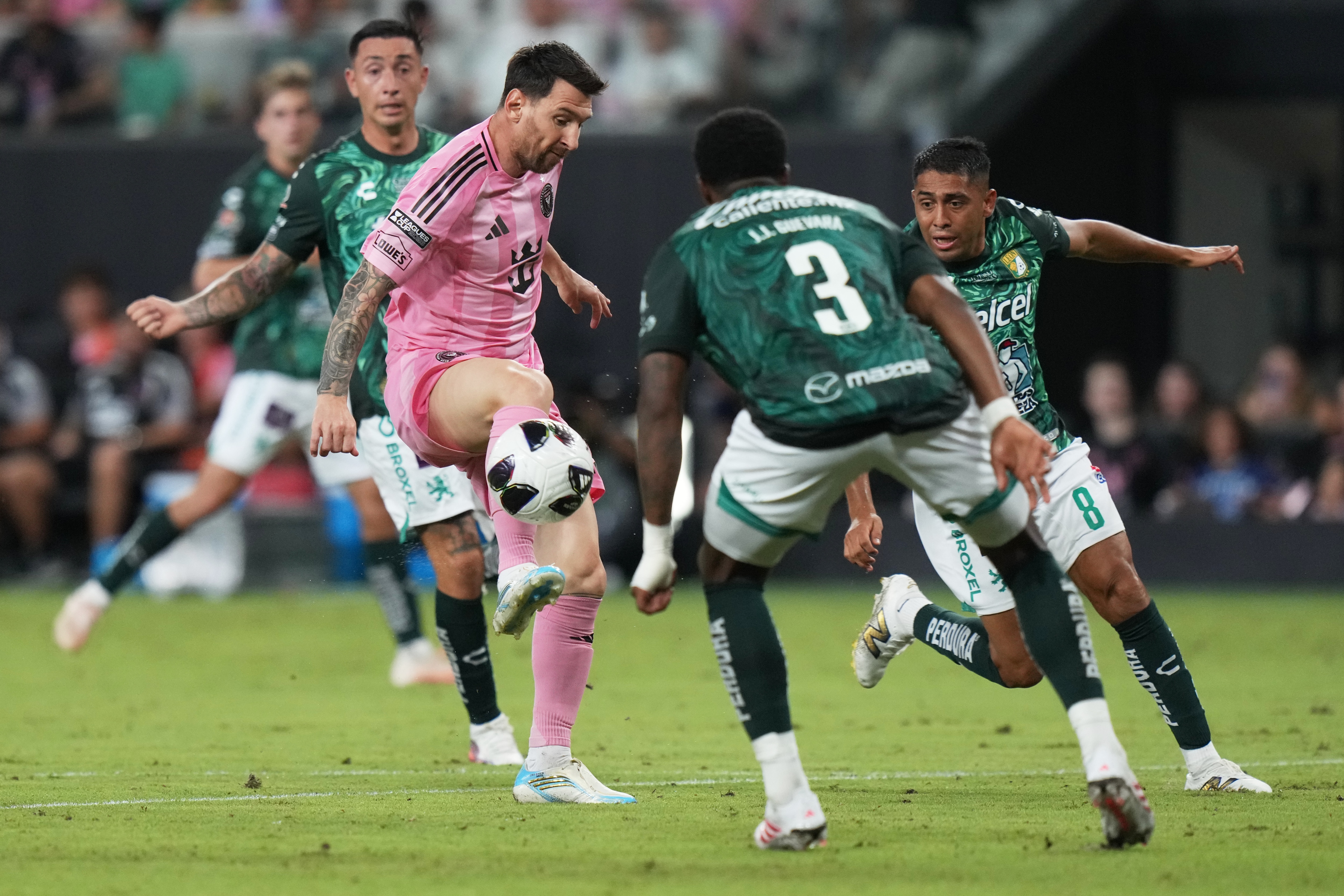 Inter Miami forward Lionel Messi, left controls the ball as Club León forward Juan Domínguez (8) defends during the second half of a Leagues Cup soccer match, Wednesday, Aug. 12, 2026, in Miami. (AP Photo/Lynne Sladky) (AP Photo/Lynne Sladky) Inter Miami forward Lionel Messi, left controls the ball as Club León forward Juan Domínguez (8) defends during the second half of a Leagues Cup soccer match, Wednesday, Aug. 12, 2026, in Miami. (AP Photo/Lynne Sladky) (AP Photo/Lynne Sladky)