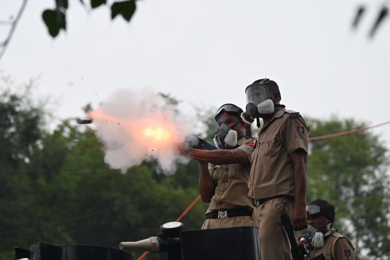 Chandigarh Police used tear gas on supporters of the Qaumi Insaf Morcha who were protesting at an entry point to Chandigarh on the Sector 51/52 dividing road on Saturday. (Ravi Kumar/HT) Chandigarh Police used tear gas on supporters of the Qaumi Insaf Morcha who were protesting at an entry point to Chandigarh on the Sector 51/52 dividing road on Saturday. (Ravi Kumar/HT)