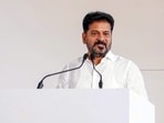 Telangana Chief Minister A Revanth Reddy launches the distribution of smart ration cards at a public meeting in Sangareddy.