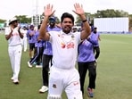 Bangladesh captain Najmul Hossain Shanto waves to the fans after his team's victory. (AFP)