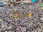 A drone view shows job aspirants and students taking out a massive 'Tiranga Yatra' procession to protest against the Jharkhand government over the JPSC and JSSC-CGL exam paper leak issues, at Albert Ekka Chowk, in Ranchi.