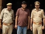 The accused in police custody (Sourced)