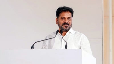Telangana Chief Minister A Revanth Reddy launches the distribution of smart ration cards at a public meeting in Sangareddy. (@revanth_anumula X) Telangana Chief Minister A Revanth Reddy launches the distribution of smart ration cards at a public meeting in Sangareddy. (@revanth_anumula X)