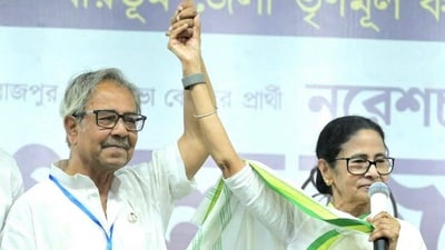 File photo of Ashis Banerjee with TMC chief Mamata Banerjee (Facebook) File photo of Ashis Banerjee with TMC chief Mamata Banerjee (Facebook)