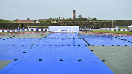 A general view shows covered ground as rain delays the start of play on second day of the first Test cricket match between Sri Lanka and India at the Galle International Stadium in Galle (AFP)