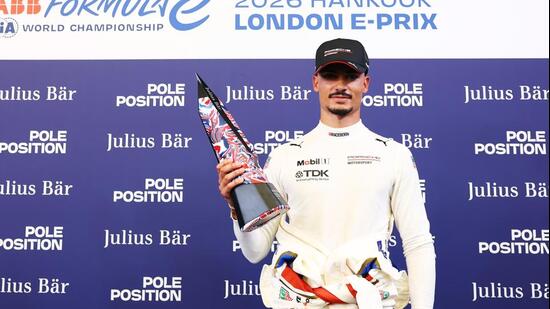 Pascal Wehrlein of Germany and Porsche Formula E Team celebrates with his trophy. (LAT Images)