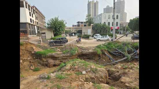 Residents allege poor planning and lack of temporary relief, while GMDA says drainage work is almost complete and will resume in September. (HT)