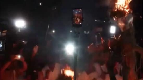 A day earlier, the protesters had demanded that Congress withdraw support from the ruling coalition since the chief minister "was not listening to him". (ANI video grab)