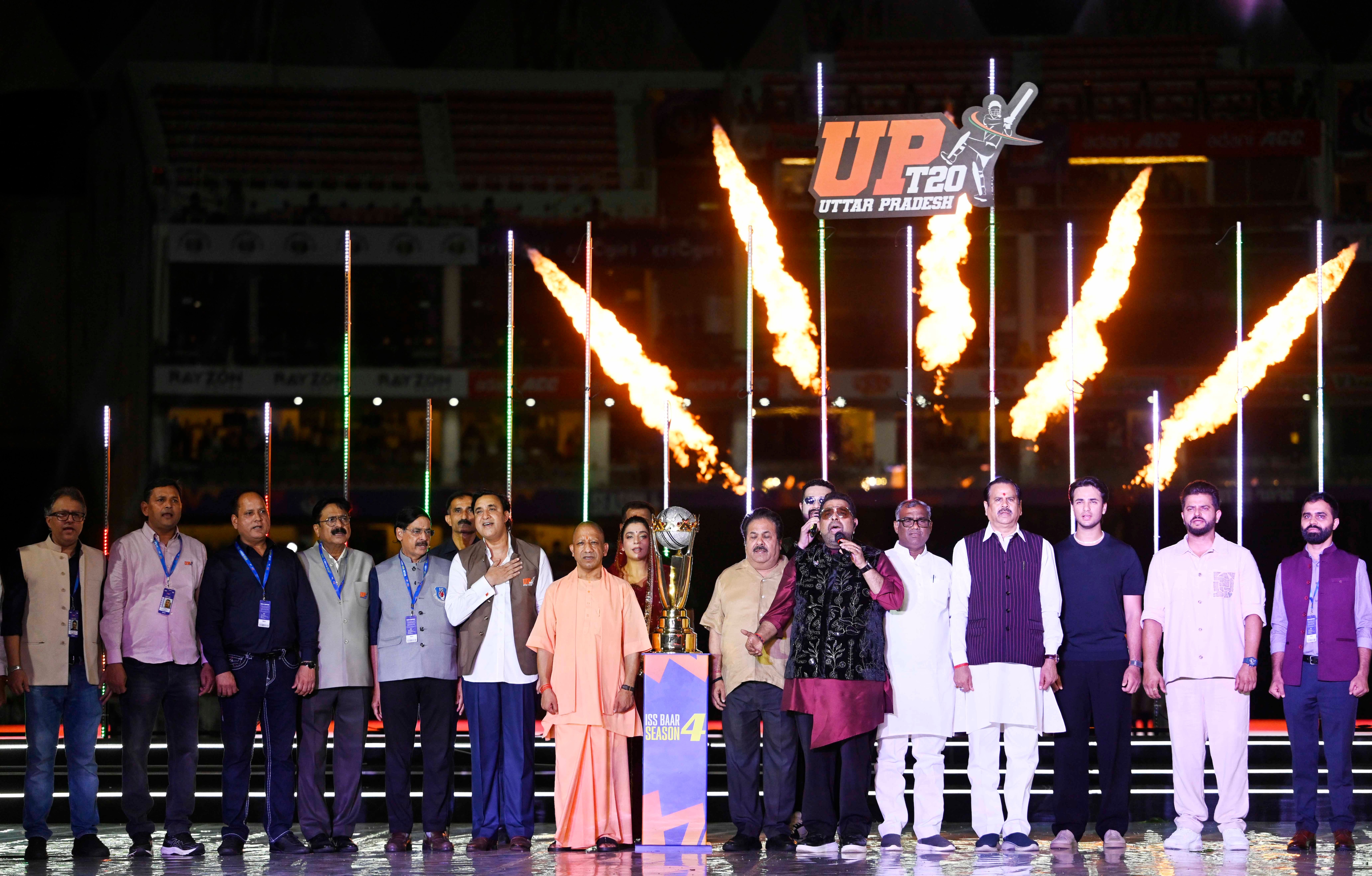 UP CM Yogi Adityanath, BCCI vice-president Rajeev Shukla, UPT20 chairman Sanjay Kapoor, singer Shankar Mahadevan, cricketers Abhishek Sharma and Suresh Raina and other at the ceremony (Photo: Deepak Gupta/HT) UP CM Yogi Adityanath, BCCI vice-president Rajeev Shukla, UPT20 chairman Sanjay Kapoor, singer Shankar Mahadevan, cricketers Abhishek Sharma and Suresh Raina and other at the ceremony (Photo: Deepak Gupta/HT)