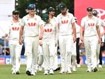 Australian captain Pat Cummins, second left, leads his players from the field following their nine wicket loss to Bangladesh on day four of the first test in Darwin Australian captain Pat Cummins, second left, leads his players from the field following their nine wicket loss to Bangladesh on day four of the first test in Darwin