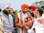 BJP workers welcoming Haryana chief minister Nayab Singh Saini in Amritsar on Sunday. (HT)