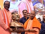 CM Yogi Adityanath pays tribute to former PM Atal Bihari Vajpayee at a commemorative event in Lucknow on Sunday. (HT photo)