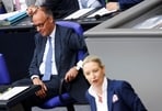 German Chancellor Friedrich Merz looks on as Alternative for Germany (AfD) co-leader Alice Weidel delivers a speech during a session of Germany's lower house of parliament, the Bundestag, in Berlin, Germany June 11, 2026. 
