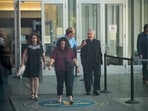 Michael and Paula Musgrove, the parents of Lindsay Clancy, who is accused of killing her children, leave the Plymouth Superior courthouse in Plymouth, Massachusetts, U.S., July 27, 2026.  Picture taken through a window. REUTERS/Brian Snyder