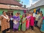 Officials involved in the Census 2027 exercise interact with residents during a door-to-door awareness campaign on self-enumeration, at Suri, in Birbhum district, West Bengal.