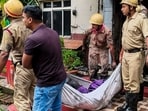 Police and fire brigade officials found the victims’ bodies on staircases and in the corridors. (PTI)