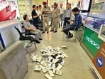 Police at the Ghumar Mandi shop, that was burgled, on Monday. (Gurpreet Singh/HT)