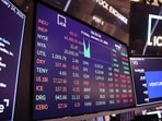 Global markets rise as weak US data cuts Fed rate-hike bets, while the dollar falls and investors watch oil, China data and Wall Street stocks.