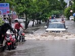 Waterlogging in Jankipuram Extension following heavy rainfall in Lucknow on Sunday. (Deepak Gupta/HT)