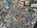 A drone view shows job aspirants and students taking out a massive 'Tiranga Yatra' procession to protest against the Jharkhand government over the JPSC and JSSC-CGL exam paper leak issues, in Ranchi on Saturday.