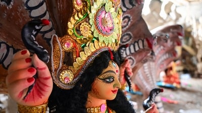 Gram it: In preparation of the upcoming Maa Mansa Puja, some artists gave some finishing touches to idols of Goddess Maa Mansa Devi, at their workshop in Gurugram. In Hindu mythology, Mansa Devi is revered as the goddess of snakes, and is traditionally regarded as the mind-born daughter of Lord Shiva, the sister of serpent king Vasuki, and the wife of sage Jaratkaru. (Photo: Sunil Ghosh/HT)