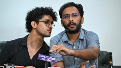 Cockroach Janta Party (CJP) spokespersons Saurav Das (L) and Ashutosh Ranka attend a press conference. (AFP/File)
