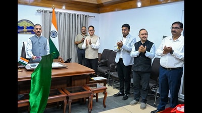 Himachal Pradesh Chief Minister Sukhvinder Singh Sukhu virtually flags off 25 e-buses for Mandi district, in Shimla on Monday. (ANI)