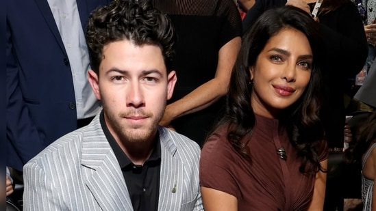 Priyanka Chopra wore a chocolate brown look, while Nick Jonas (left) was seen in pinstripe grey. (Instagram/ EatTweetBlog)