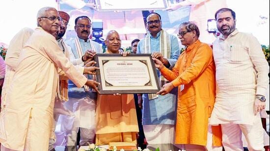 Chief minister Yogi Adityanath during a programme to launch the e-PoS-based fair price shop dealer feedback system in Lucknow on Monday. (ANI PHOTO)
