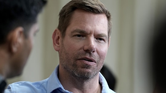 FILE - California gubernatorial candidate Rep. Eric Swalwell, D-Calif., talks with reporters after holding a town hall meeting in Sacramento, Calif., April 7, 2026. (AP Photo/Rich Pedroncelli, File) (AP Photo/Rich Pedroncelli)