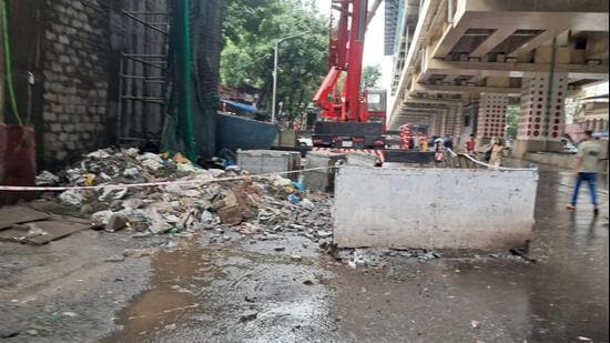 Images and videos showed broken granite slabs and tiles scattered on the road beneath the under-construction Medetiya Nagar metro station